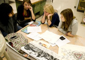 Photo by Preece Mural club members Staci Darby, Cassie Jones, Sara Irick and Michelle Landis met on Tuesday, Oct. 27, to brainstorm ideas for their upcoming mural. “We’re trying to put something unique on the walls that can’t be found in other murals,” said Irick.