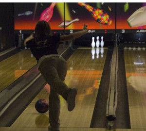 Photo by Bailey Kopp Trying for a spare, sophomore Brianna Laveigne releases the ball on Feb. 4